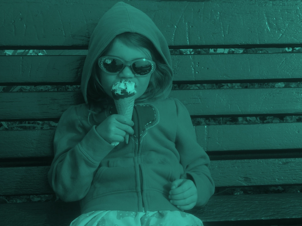 Eating an ice cream.